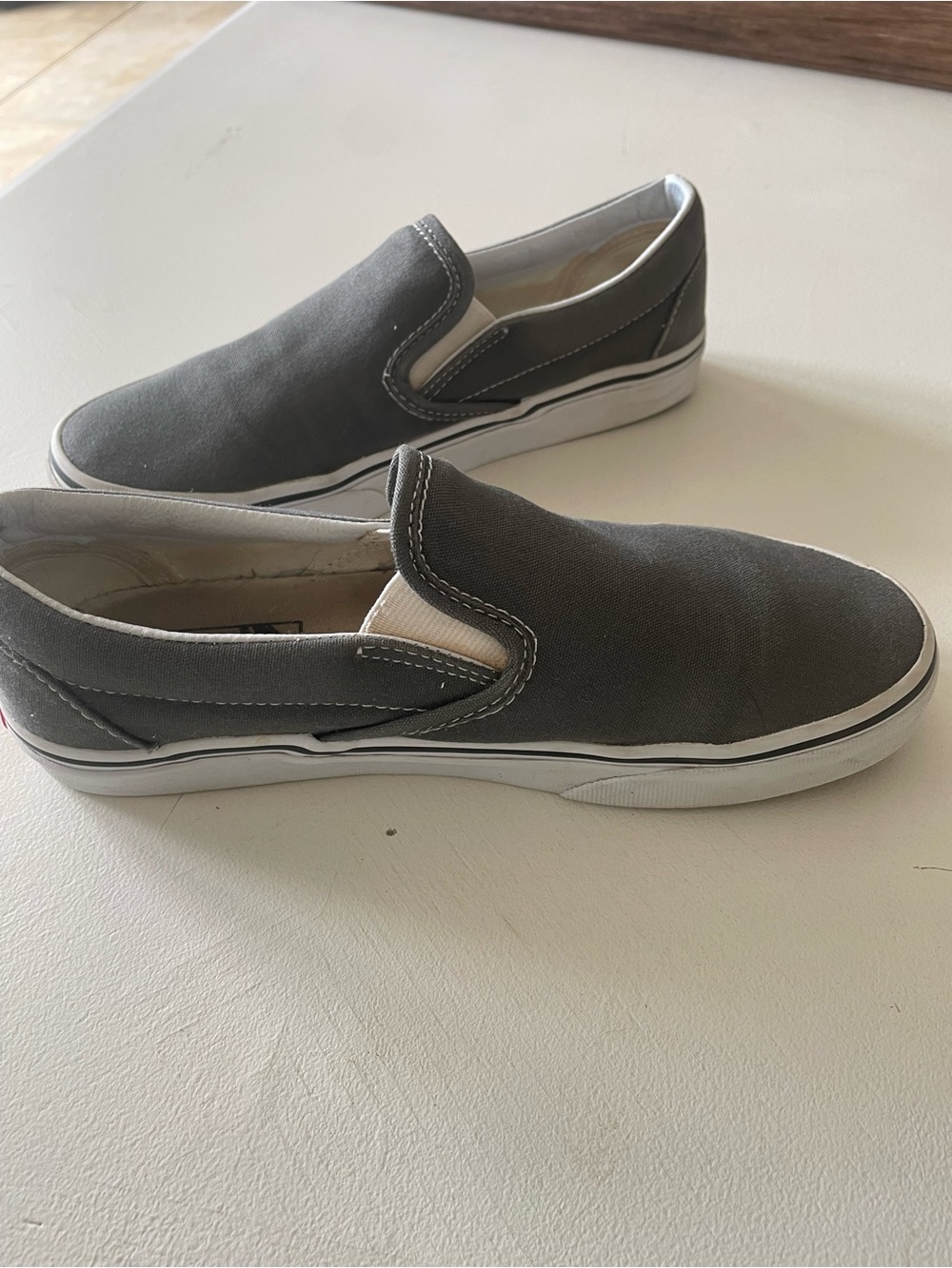 Vans Slip-On Sneakers in Gray and White
